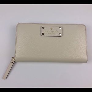 Kate Spade Spencer Zip-Around Large Continental Wallet eggshell with brick red